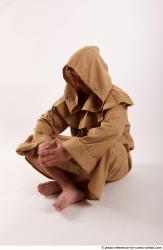 Joel Adamson Monk Sitting Pose